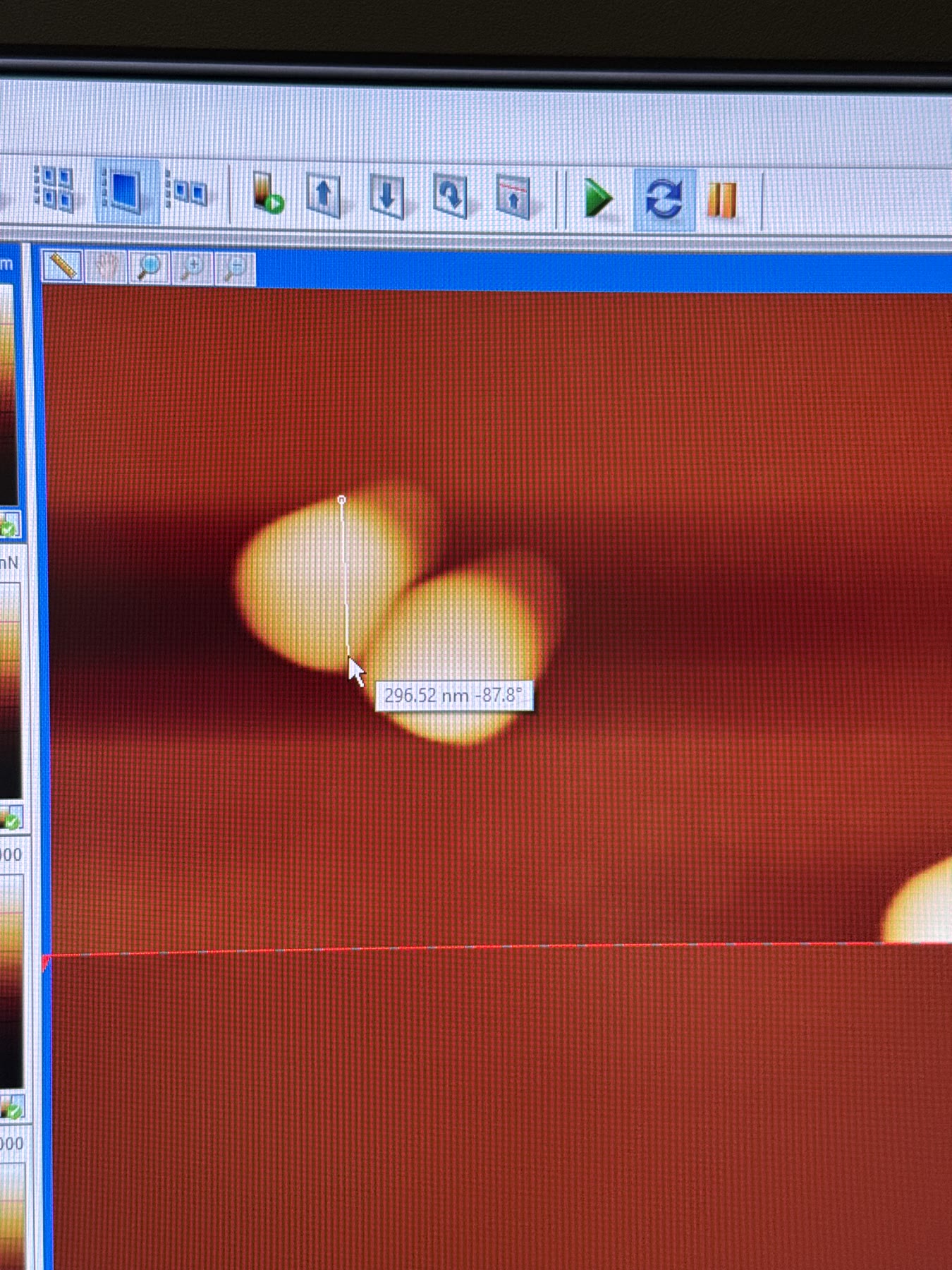 Nanoparticle features being measured on an instrument display