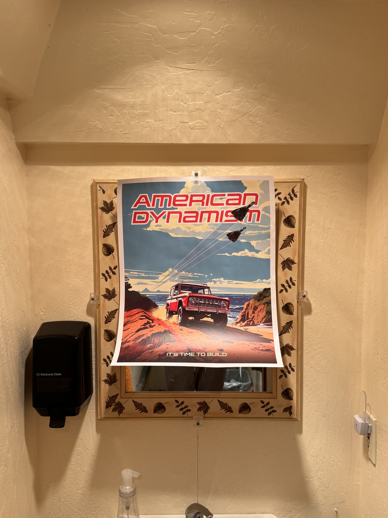 American Dynamism poster featuring a red off-road vehicle and two aircraft