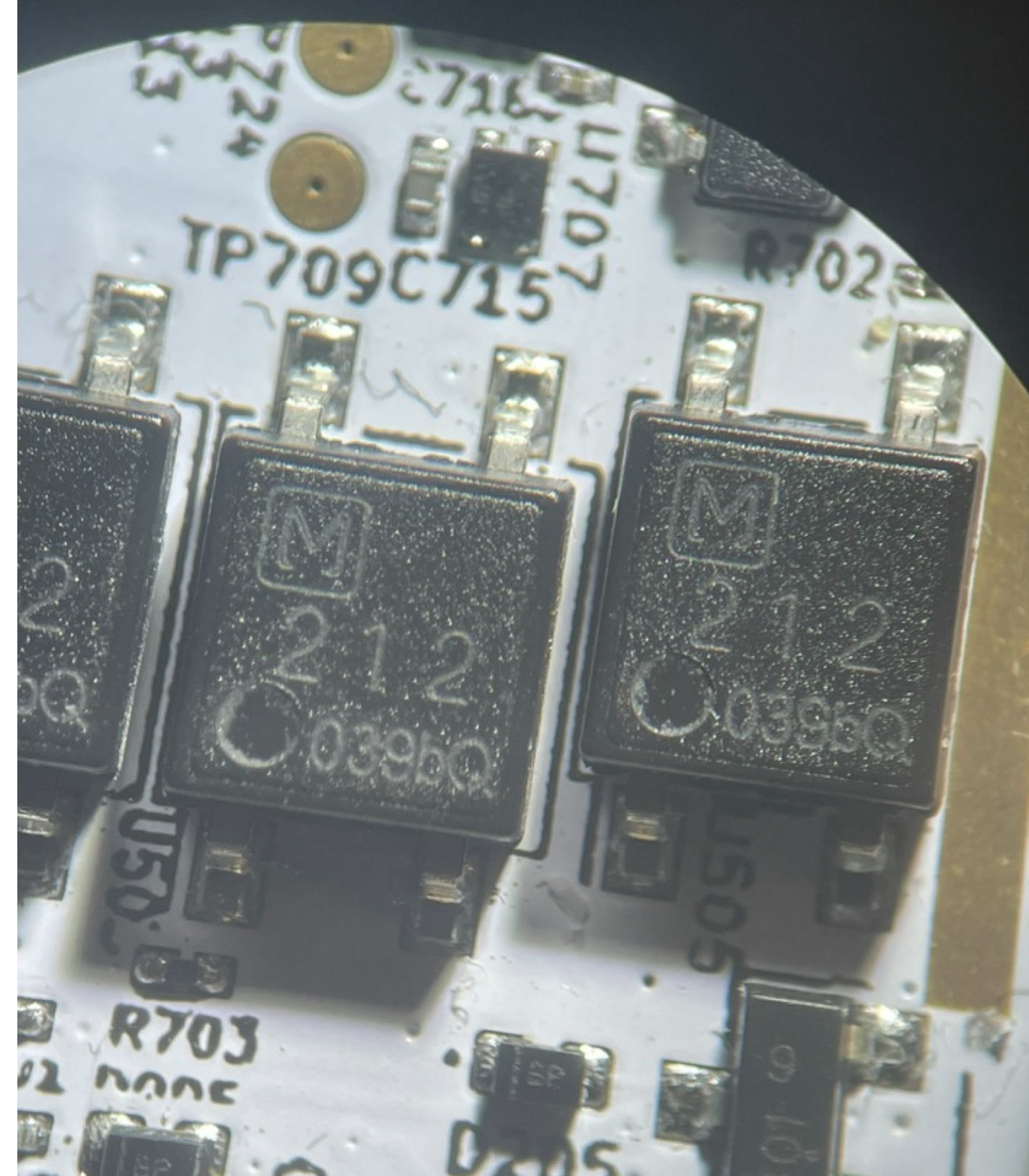 Power MOSFETs inspected through a microscope
