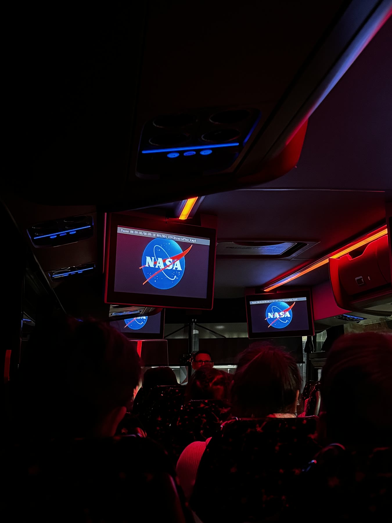 NASA logos displayed inside a Kennedy Space Center tour bus