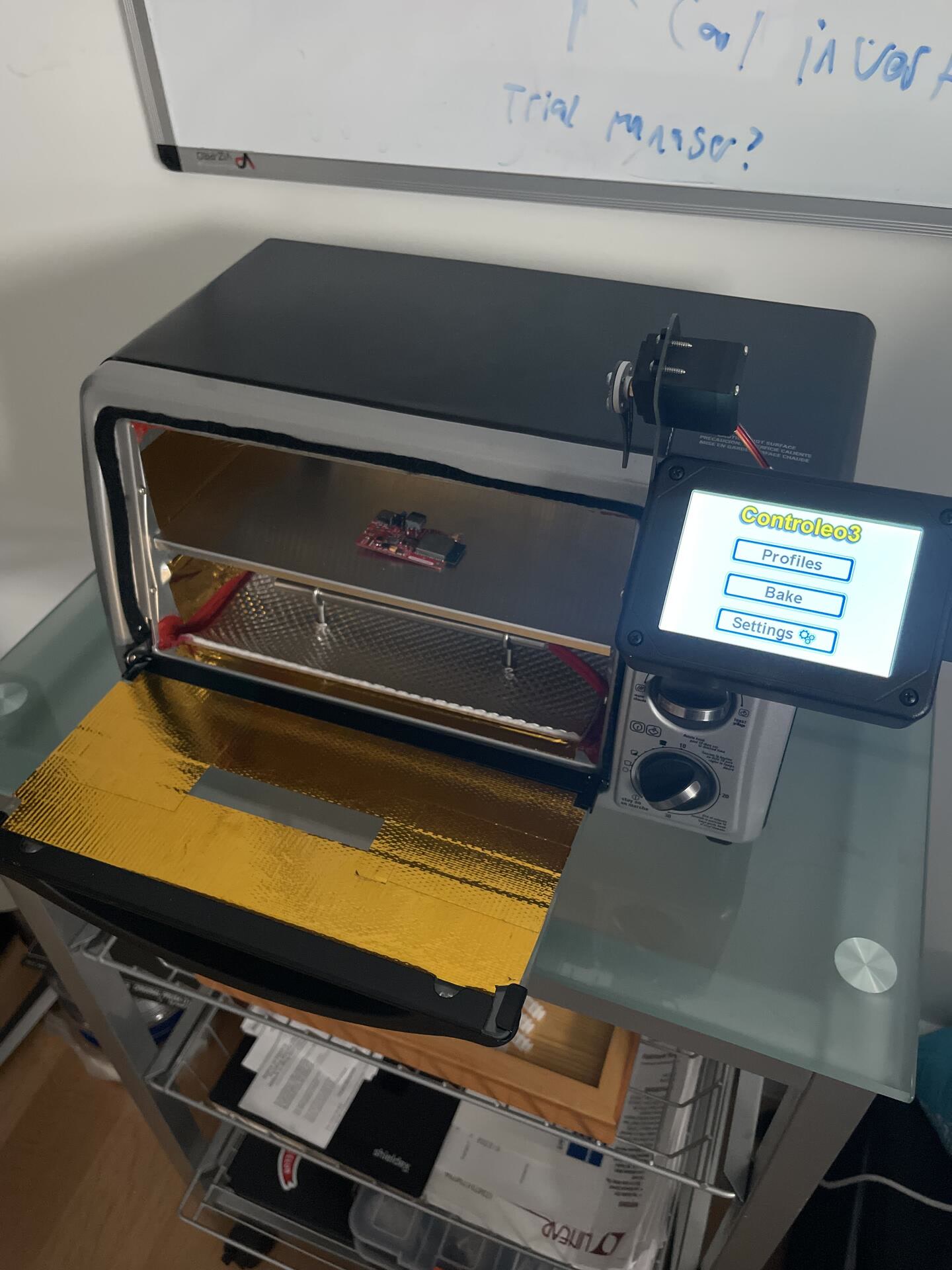 Retrofitted toaster oven with a digital process controller