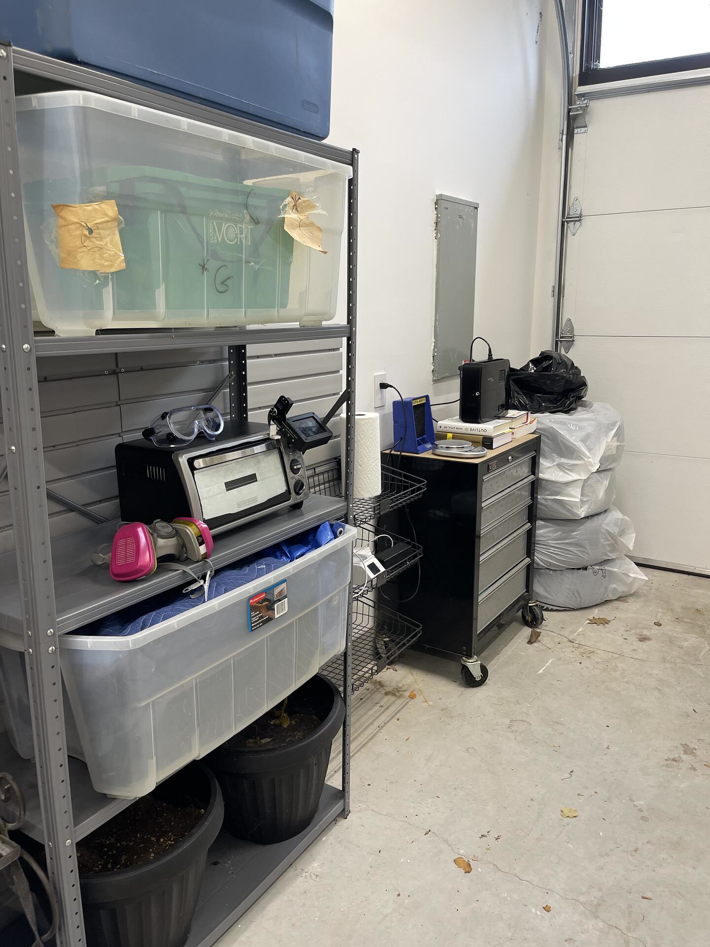 Garage nanofabrication workspace with oven, tools, and storage