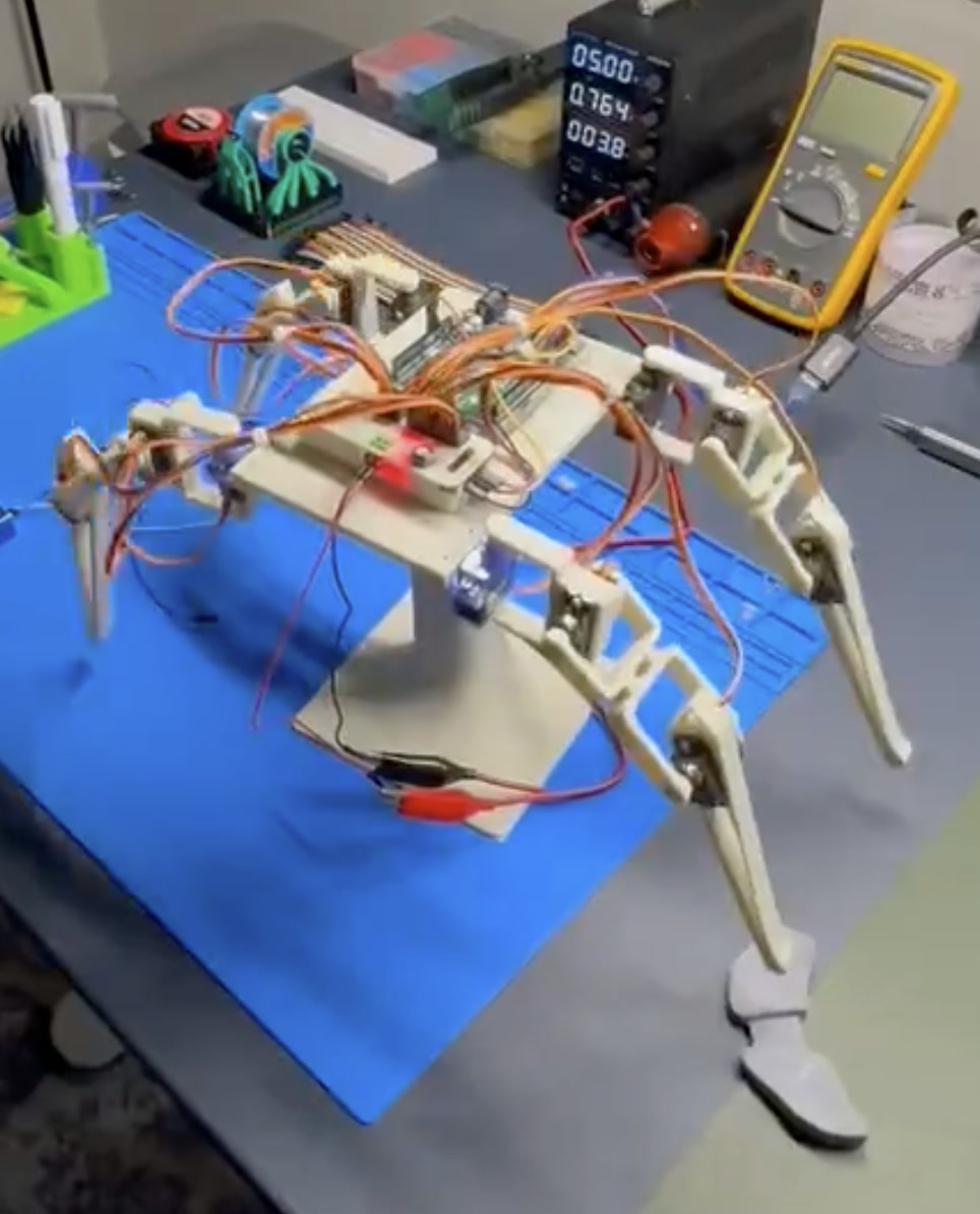 3D-printed crab robot with articulated legs and test wiring