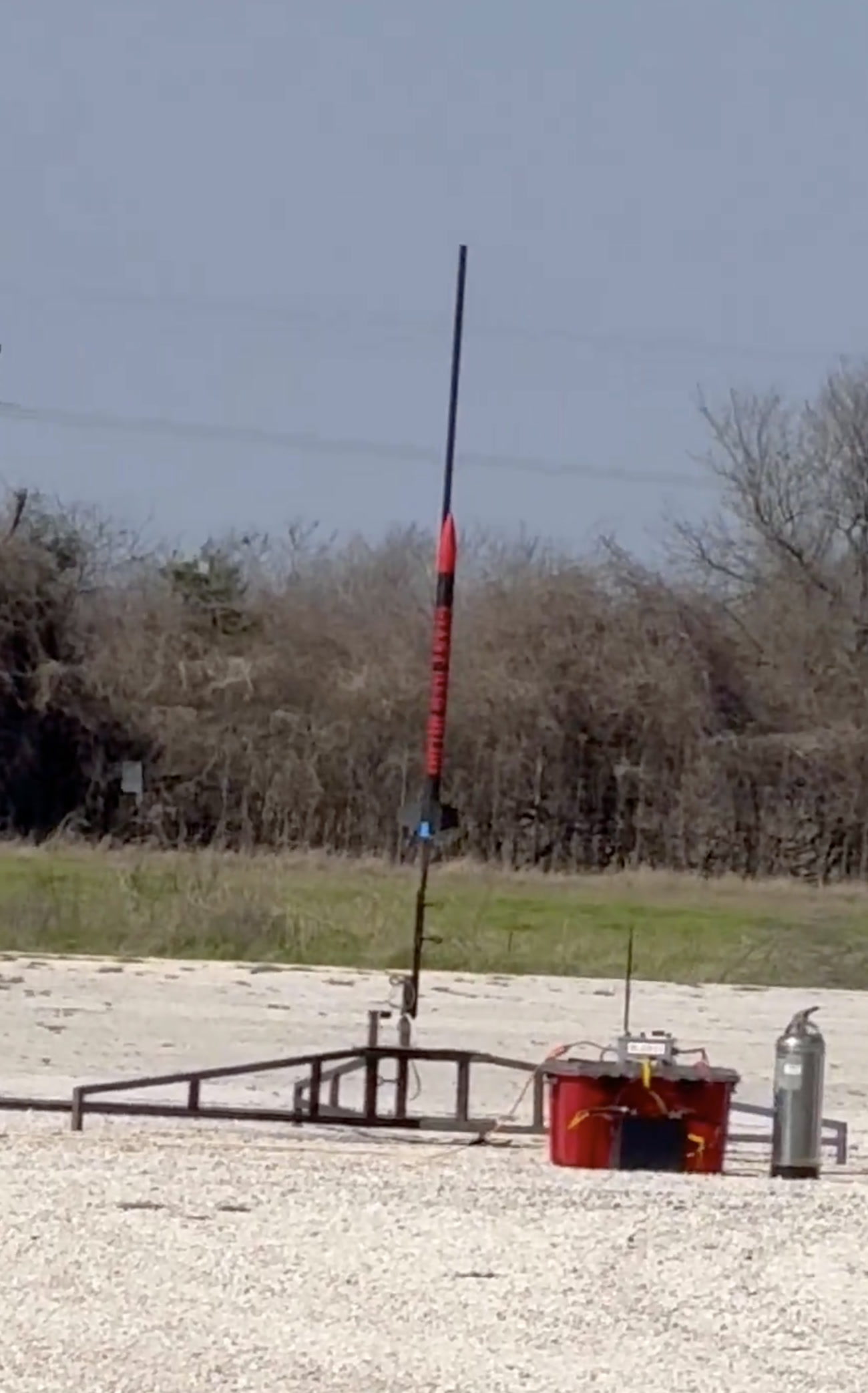 Rocket standing on a launch rail at FAR in the Mojave Desert