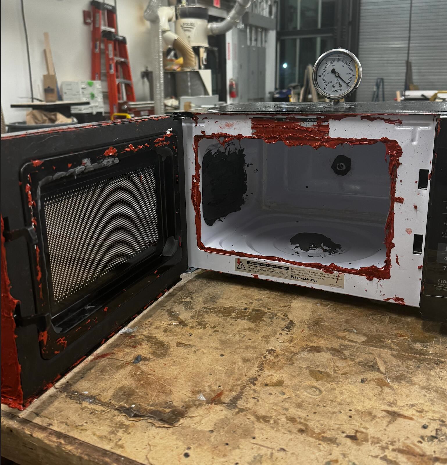 Modified microwave enclosure sealed for use as a plasma chamber