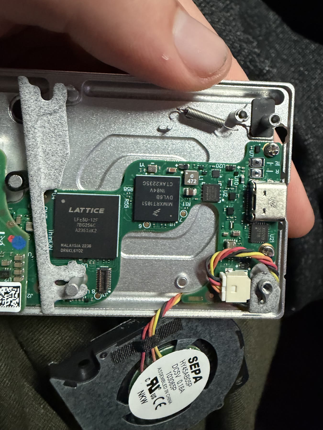 Assembled PCB installed in a compact aluminum enclosure