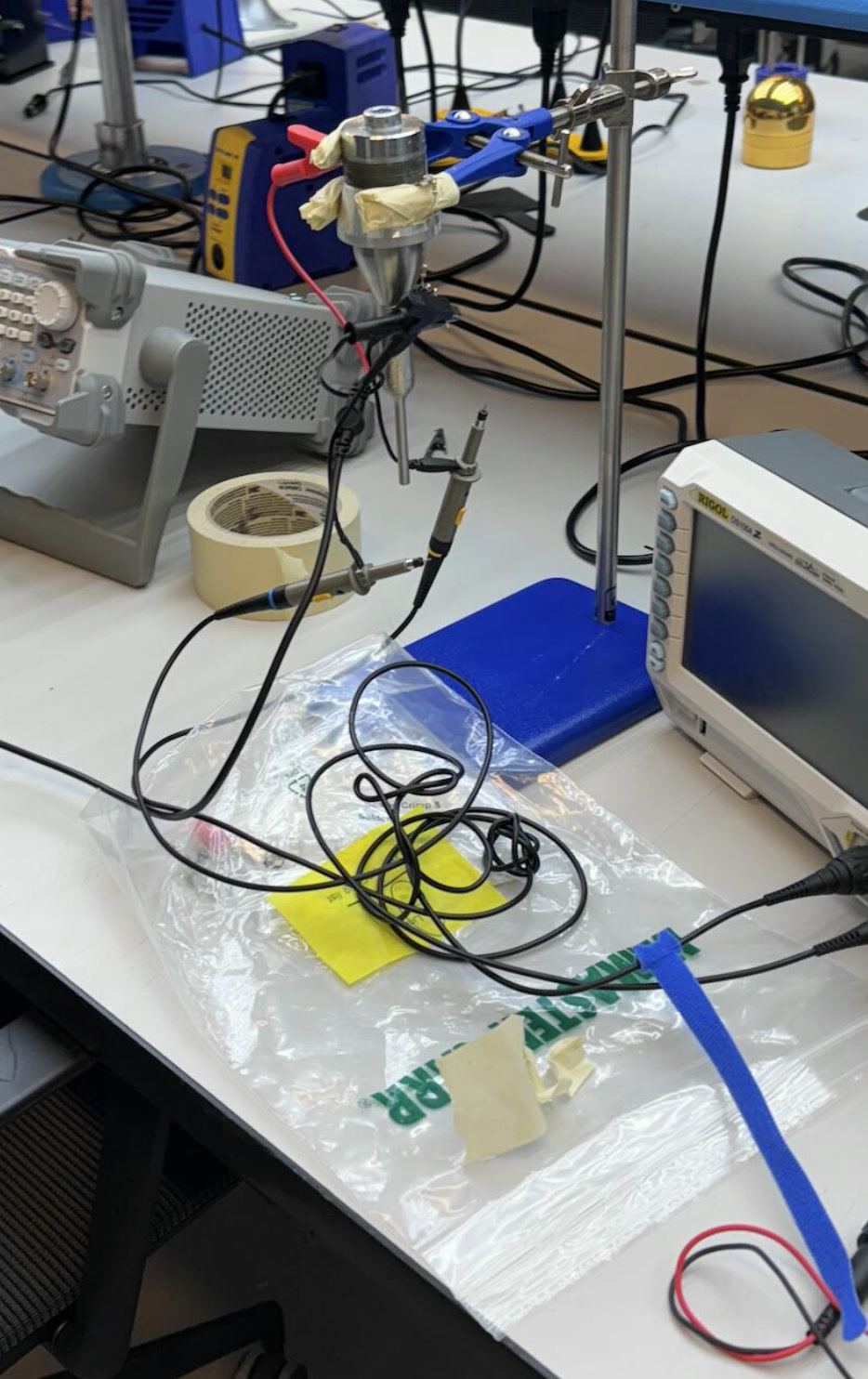Sonotrode connected to test equipment on a laboratory bench